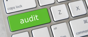picture of a keyboard with the caps lock key changed to the word audit.